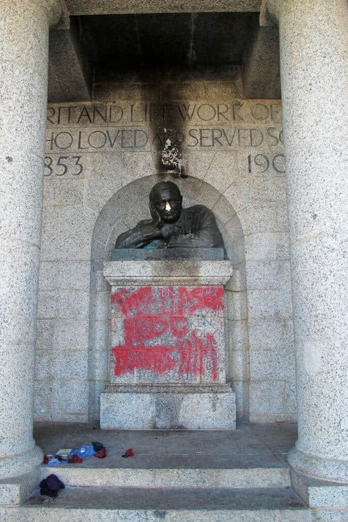 "The Master's Nose Betrays Him" read graffiti anderneath the defaced Rhodes Memorial statue in Cape Town. Photograph: Kim Gurney