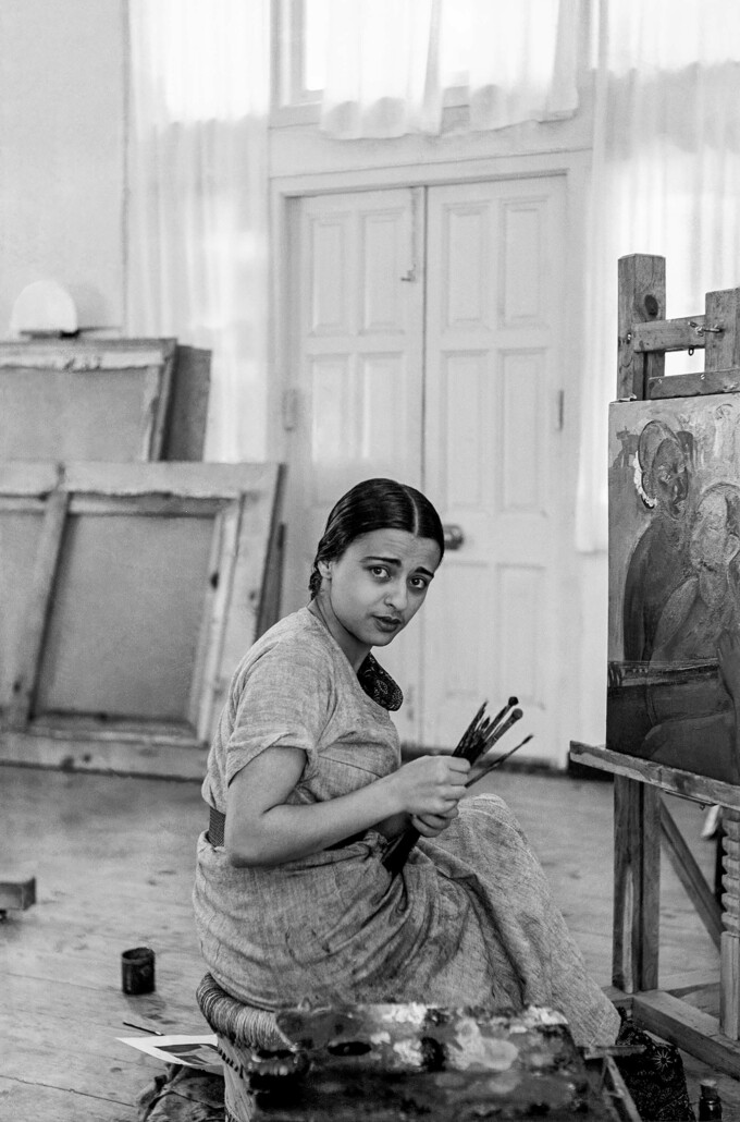 Umrao Singh Sher-Gil, Amrita at her easel. Simla, India, (1937). Courtesy The Estate of Umrao Singh Sher-Gil and PHOTOINK
